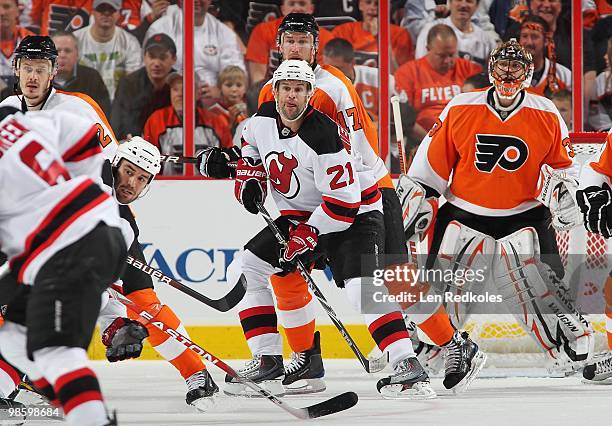Rob Niedermayer of the New Jersey Devils sets up in the slot for a scoring opportunity against Jeff Carter and Brian Boucher of the Philadelphia...