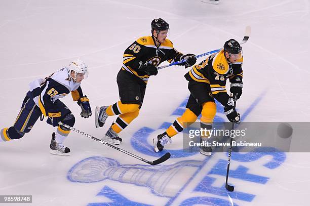 Michael Ryder of the Boston Bruins skates with the puck against the Buffalo Sabres in Game Four of the Eastern Conference Quarterfinals during the...