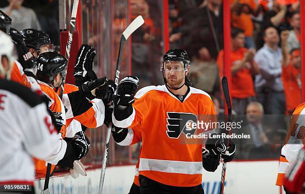 Jeff Carter of the Philadelphia Flyers celebrates his second period goal against the New Jersey Devils to give the Flyers a 3-1 lead in Game Four of...