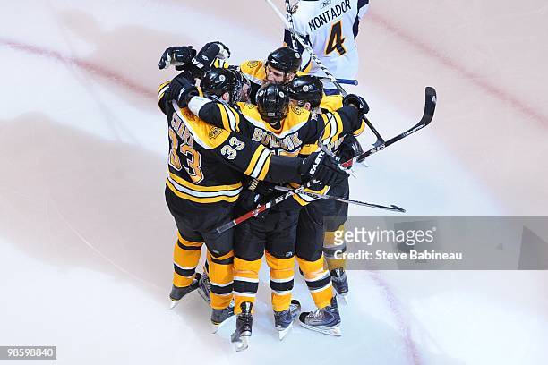 Patrice Bergeron of the Boston Bruins scores a goal against the Buffalo Sabres in Game Four of the Eastern Conference Quarterfinals during the 2010...