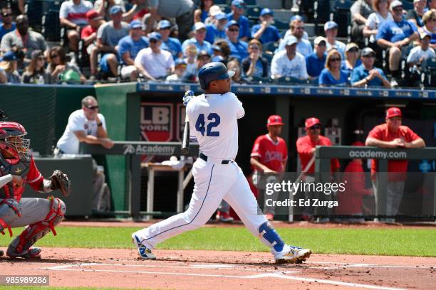 Salvador Perez of the Kansas City Royals hits against the Los Angeles Angels of Anaheim at Kauffman Stadium on June 25, 2018 in Kansas City,...