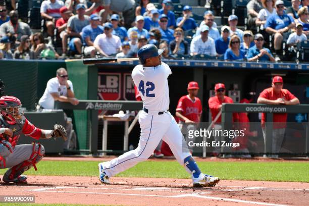 Salvador Perez of the Kansas City Royals hits against the Los Angeles Angels of Anaheim at Kauffman Stadium on June 25, 2018 in Kansas City,...