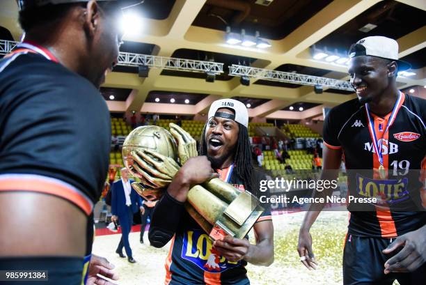 Youssoupha Fall and Mykal Riley of Le Mans with the trophy during the Final Jeep Elite match between Monaco and Le Mans on June 24, 2018 in Monaco,...