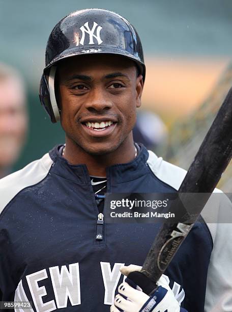 Curtis Granderson of the New York Yankees takes batting practice before the game against the Oakland Athletics at the Oakland-Alameda County Coliseum...