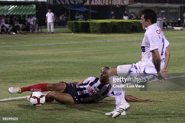 Alfredo Rojas of Paraguayan Nacional fights for the ball with Abraham Carreno of Mexican Monterrey during their Copa Santander Libertadores de...