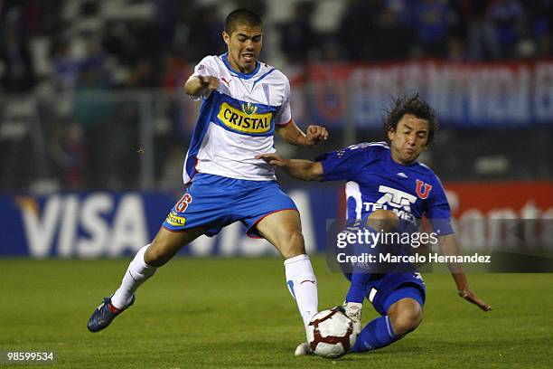 Gabriel Vargas of Universidad de Chile fights for the ball with Francisco Silva of Universidad Catolica during their Santander Libertadores Cup...