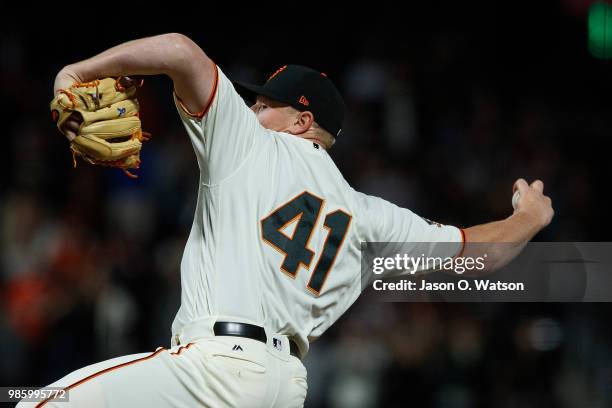 Mark Melancon of the San Francisco Giants pitches against the San Diego Padres during the ninth inning at AT&T Park on June 21, 2018 in San...