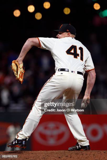 Mark Melancon of the San Francisco Giants pitches against the San Diego Padres during the ninth inning at AT&T Park on June 21, 2018 in San...