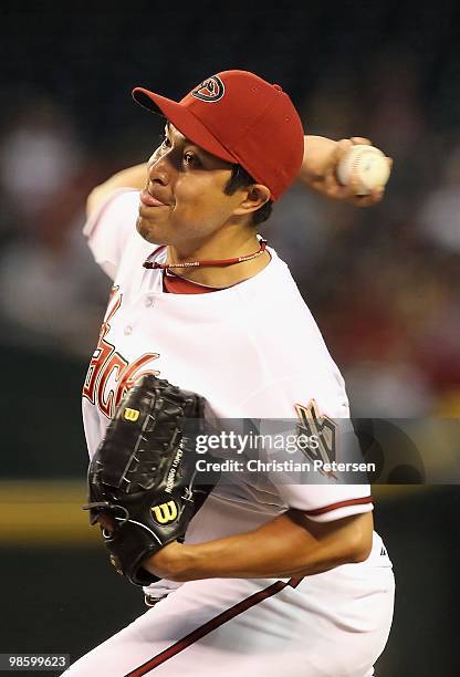 Starting pitcher Rodrigo Lopez of the Arizona Diamondbacks pitches against the St. Louis Cardinals during the Major League Baseball game at Chase...