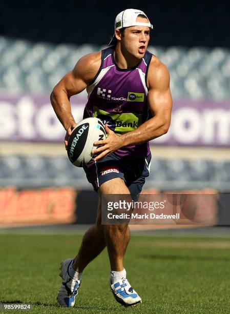 Cooper Cronk of the Storm looks to throw a pass during a Melbourne Storm NRL training session at Visy Park on April 22, 2010 in Melbourne, Australia.