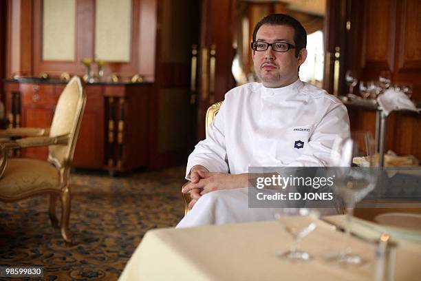 Chef Frederic Chabert sits in a dining room of the Petrus restaurant at the luxury Island Shangri-La hotel in Hong Kong on April 22, 2010. As...