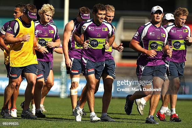 Cameron Smith of the Storm leads all players to the change room at the completion of a Melbourne Storm NRL training session at Visy Park on April 22,...