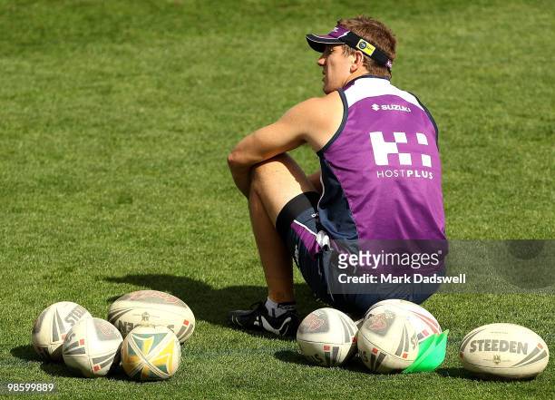 Ryan Hoffman of the Storm speaks with players as he sits on a football during a Melbourne Storm NRL training session at Visy Park on April 22, 2010...