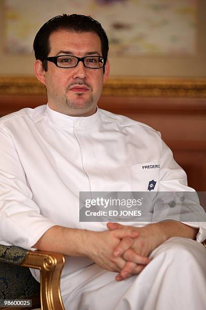 Chef Frederic Chabert of France sits in a dining room of the Petrus restaurant at the luxury Island Shangri-La hotel in Hong Kong on April 22, 2010....