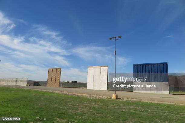 January 2018, Mexico, Tijuana: The prototypes of the wall that US President Trump plans to erect on the border can be seen from the existing border...