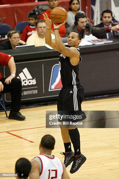 Curtis Jerrells of the Austin Toros attempts a shot over Will Conroy of the Rio Grande Valley Vipers during the Viper vs Toros game. The Vipers beat...