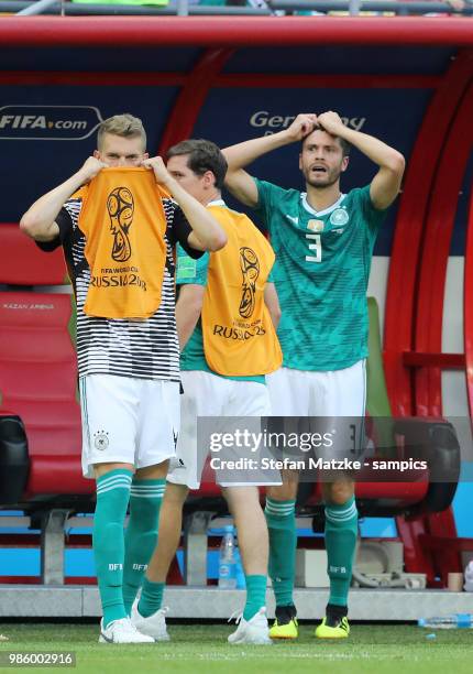 Matthias Ginter of Germany Sebastian Rudy of Germany Jonas Hector of Germany reacts following there team's loss during the 2018 FIFA World Cup Russia...