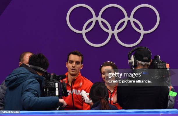 Annika Hocke and Ruben Blommaert from Germany sitting on the bench during the figure skating free skate event of the 2018 Winter Olympics in the...