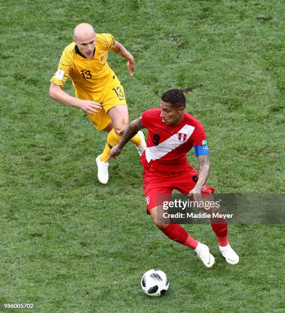 June 26: Aaron Mooy of Australia defends Jose Paolo Guerrero of Peru during the 2018 FIFA World Cup Russia group C match between Australia and Peru...