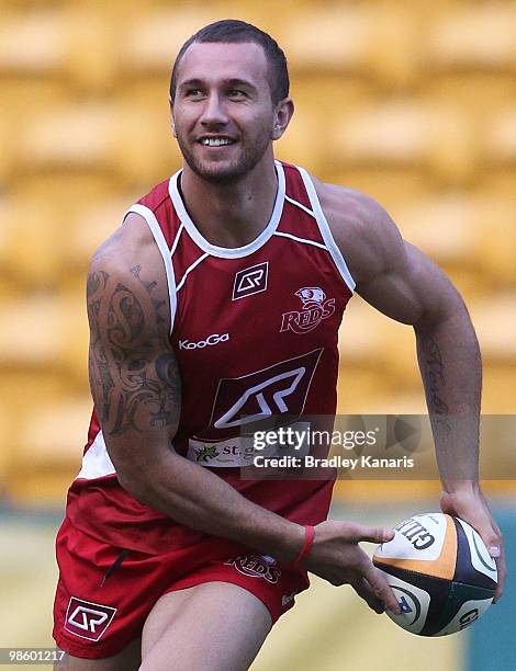 Quade Cooper looks to pass during the Reds Super 14 training session at Suncorp Stadium on April 22, 2010 in Brisbane, Australia.