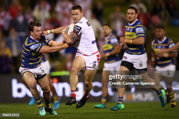 Euan Aitken of the Dragons makes a break during the round 16 NRL match between the St George Illawarra Dragons and the Parramatta Eels at WIN Stadium...