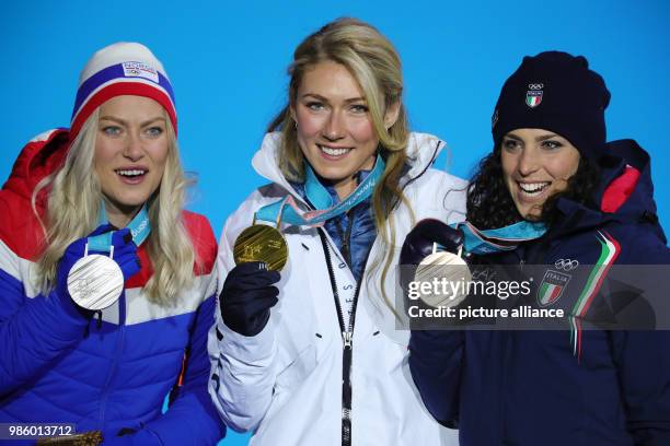 S Mikaela Shiffrin , Norway's Ragnhild Mowinckel and Italy's Federica Brignone celebrate during the award ceremony after the women's alpine skiing...