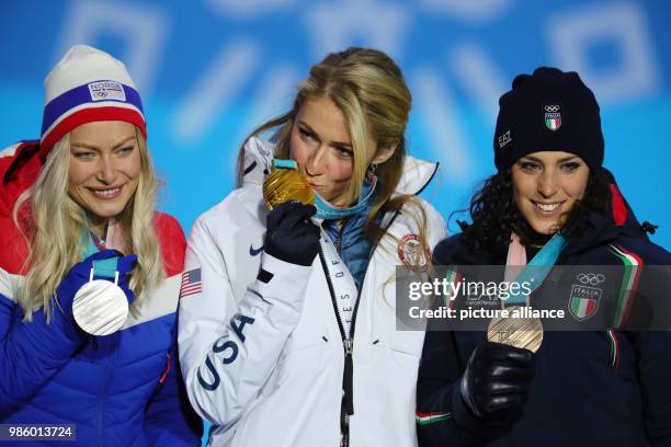 S Mikaela Shiffrin , Norway's Ragnhild Mowinckel and Italy's Federica Brignone celebrate during the award ceremony after the women's alpine skiing...