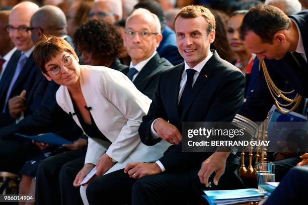 French President Emmanuel Macron arrives with French Overseas Minister Annick Girardin to attend the meeting "Assises des outre-mer" at the Elysee...