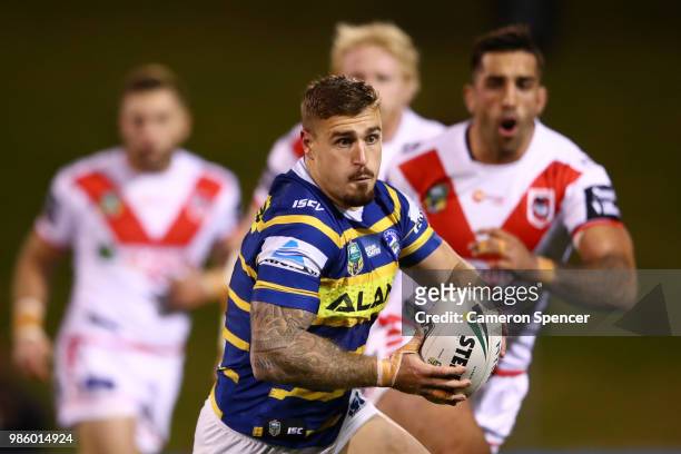 Cameron King of the Eels runs the ball during the round 16 NRL match between the St George Illawarra Dragons and the Parramatta Eels at WIN Stadium...
