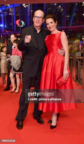 Herbert Knaup and his wife Christiane Knaup attend the opening night of the film 'Isle of Dogs' during the Berlinale Festival in Berlin, Germany, 15...