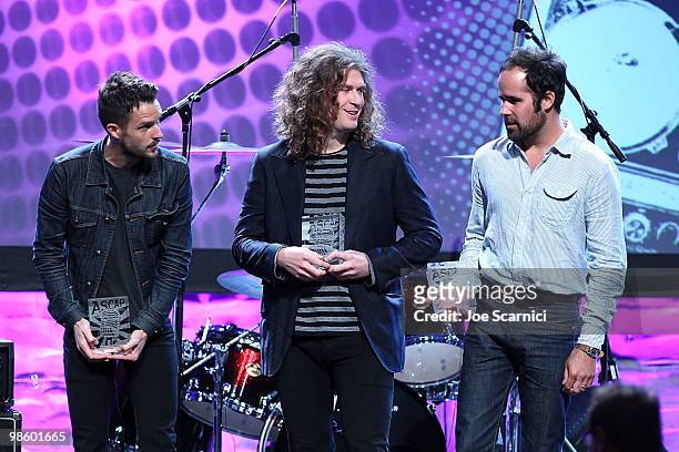 Brandon Flowers, Dave Keuning, and Ronnie Vannucci Jr of The Killers accept their ASCAP Award at the 27th Annual ASCAP Pop Music Awards Show at...