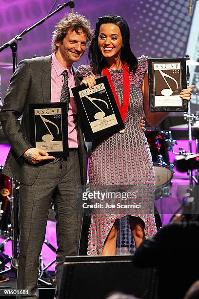 Lukasz "Dr. Luke" Gottwald and Katy Perry accept the ASCAP Award at the 27th Annual ASCAP Pop Music Awards Show at Renaissance Hollywood Hotel on...