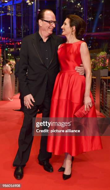 February 2018, Berlin: Berlinale, Opening, 'Isle of Dogs': Actor Herbert Knaup and his wife Christiane Knaup. Photo: Jens Kalaene/dpa