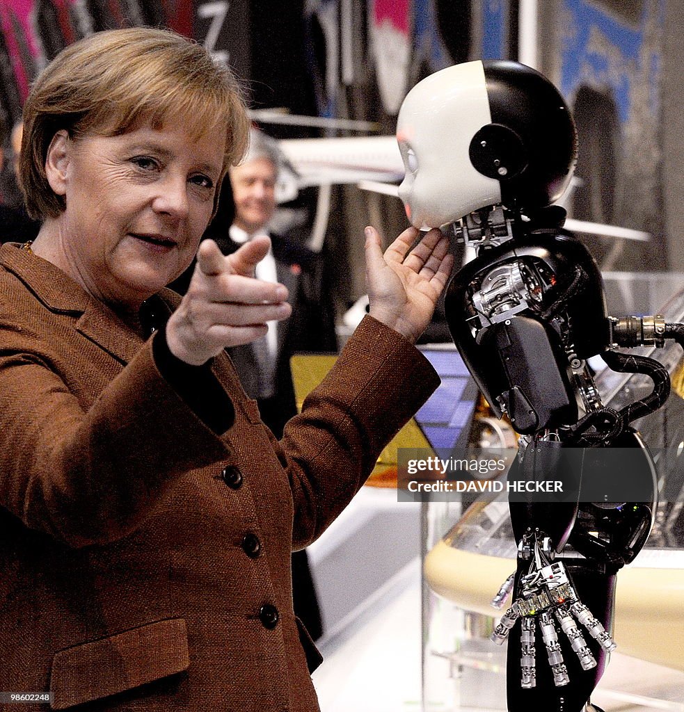 German Chancellor Angela Merkel gestures