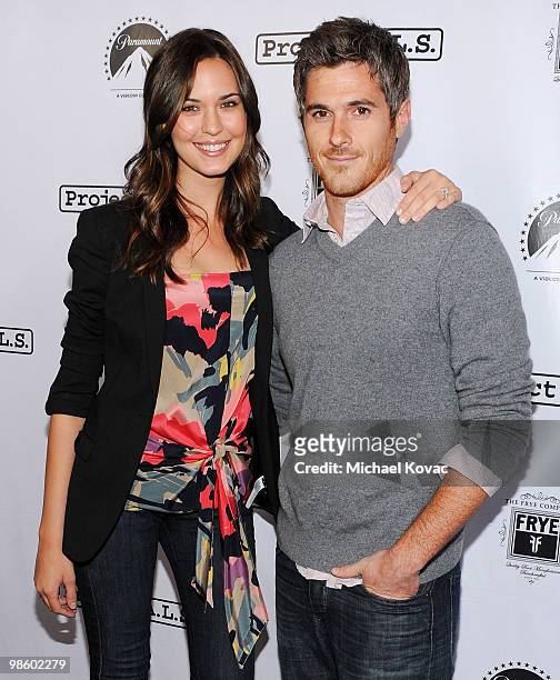 Actor Dave Annable and fiancee actress Odette Yustman arrive at the Project A.L.S. LA Benefit hosted by Ben Stiller & Friends at Lucky Strike Bowling...