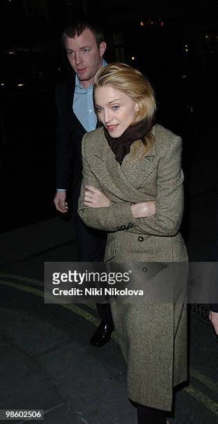 Madonna and Guy Ritchie arrive at a West London restaurant *exclusive*