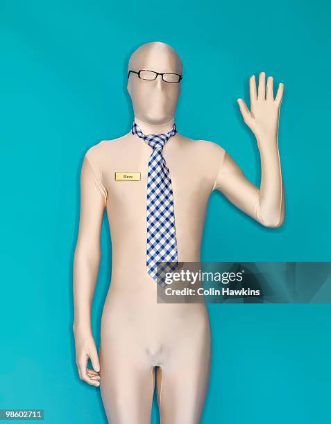 man in body suit waving  - colin hawkins stock pictures, royalty-free photos & images