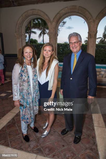 Katie Carpenter, Rebel Carpenter and Chris Chase attend Sharon Bush Hosts Benefit Dinner for Cristo Rey Brooklyn High School at Private Estate on...