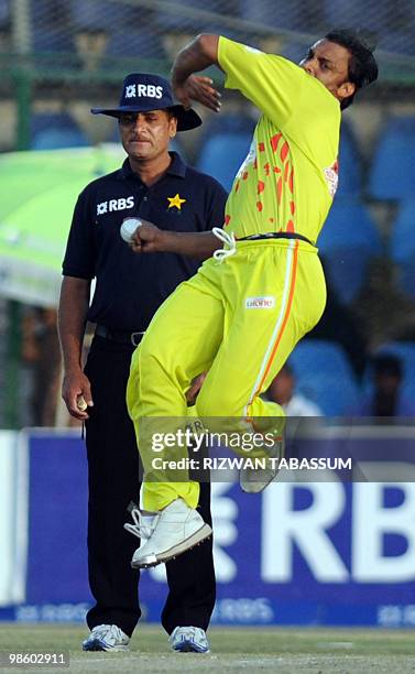 Cricket-PAK-Akhtar Pakistani cricketer Shoaib Akhtar delivers the ball during a domestic one-day match in Karachi late on April 21, 2010....