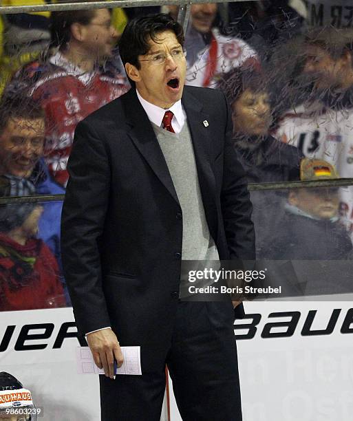 Uwe Krupp, head coach of Germany screems during the pre IIHF World Championship match between Germany and Norway at the Sahnpark on April 16, 2010 in...