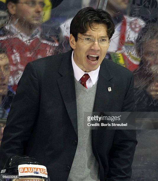 Uwe Krupp, head coach of Germany screems during the pre IIHF World Championship match between Germany and Norway at the Sahnpark on April 16, 2010 in...