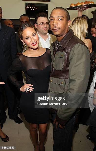 Adrienne Bailon and Ja Rule attend the NFL Draft grand opening celebration at Rafaello & Co Jewelers on April 21, 2010 in New York City.