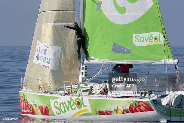 Skippers, British Samantha Davies and French Romain Attanasio, sail off Portugal's coast on their "Saveol" monohull on April 22 during the AG2R La...