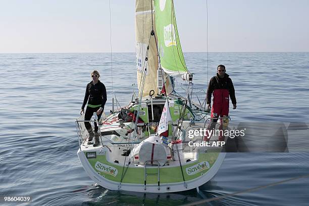 Skippers, British Samantha Davies and French Romain Attanasio, sail off Portugal's coast on their "Saveol" monohull on April 22 during the AG2R La...