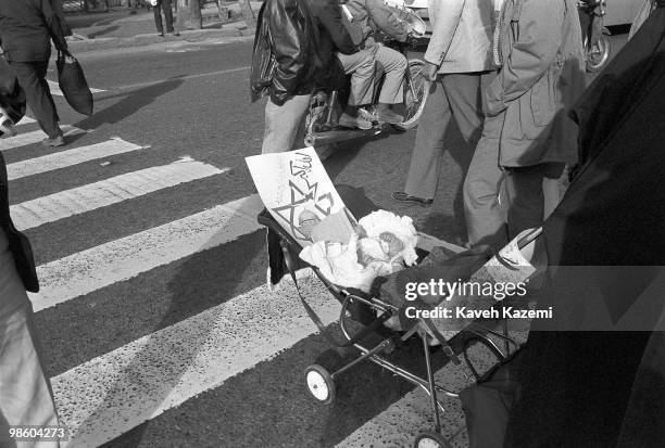 Pro government demonstrators head to protest on the last Friday of Ramadan, named Qods Day by Ayatollah Khomeini in Tehran, 1st February 1990. It is...