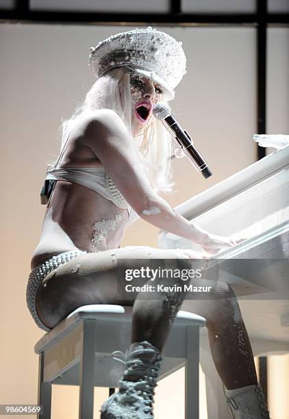 Lady Gaga performs at AMFAR on a Terence Koh designed piano, inspired by the MáAáC Viva Glam campaign at AMFAR at Cipriani 42nd Street on February...