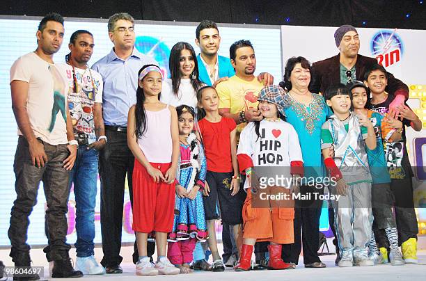 Choreographers Bosco-Caesar, Ahmed Khan, Saroj Khan, Parvesh Rana and child actor Saloni pose with the participants of the show Chak Dhoom Dhoom in...