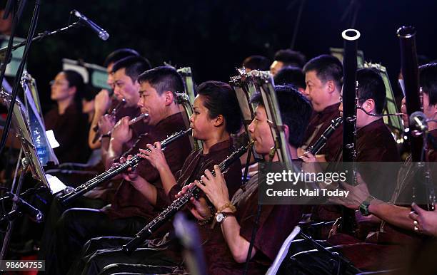 China's Shenzhen Symphonic Orchestra performs at the Purana Qila in New Delhi on April 20, 2010.