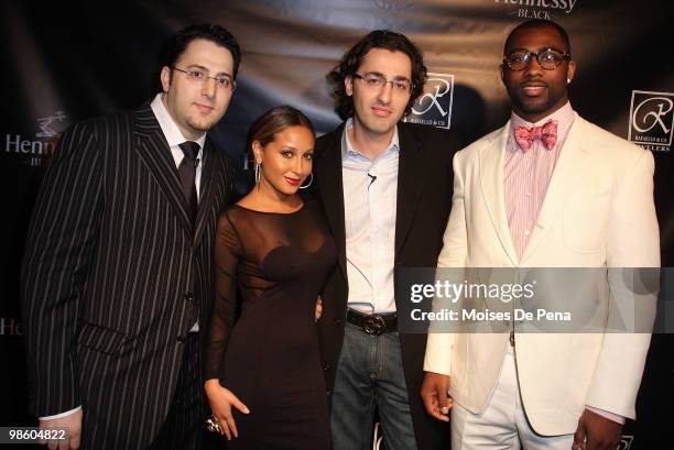 Avi Aranbayev, Singer Adrienne Bailon, Gabriel Jacobs and NY Jets star Darrelle Revis attend the NFL Draft grand opening celebration at Rafaello & Co...
