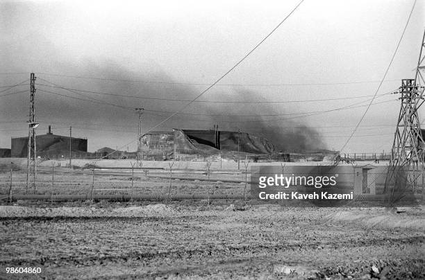 View of burning oil refinery destroyed by Iraqi bombings during Iran-Iraq war, in Abadan, south Iran.